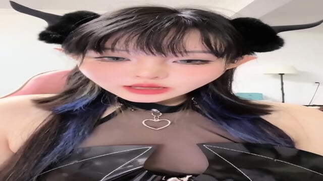 Cute Chinese Devil Gets Ready to Seduce